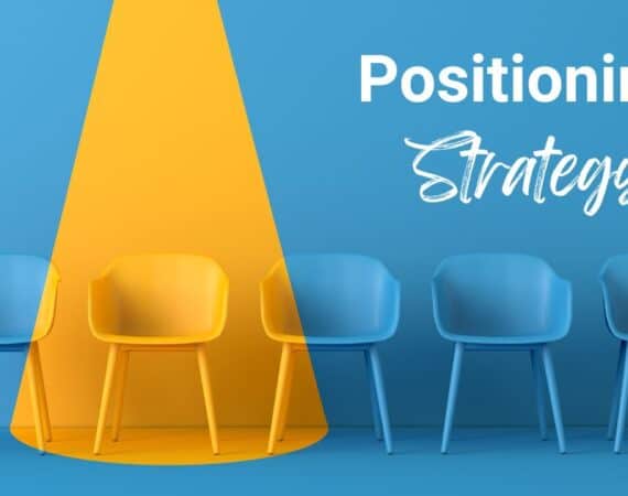Four blue chairs, one is yellow with text "positioning strategy" intended to depict tips for product positioning